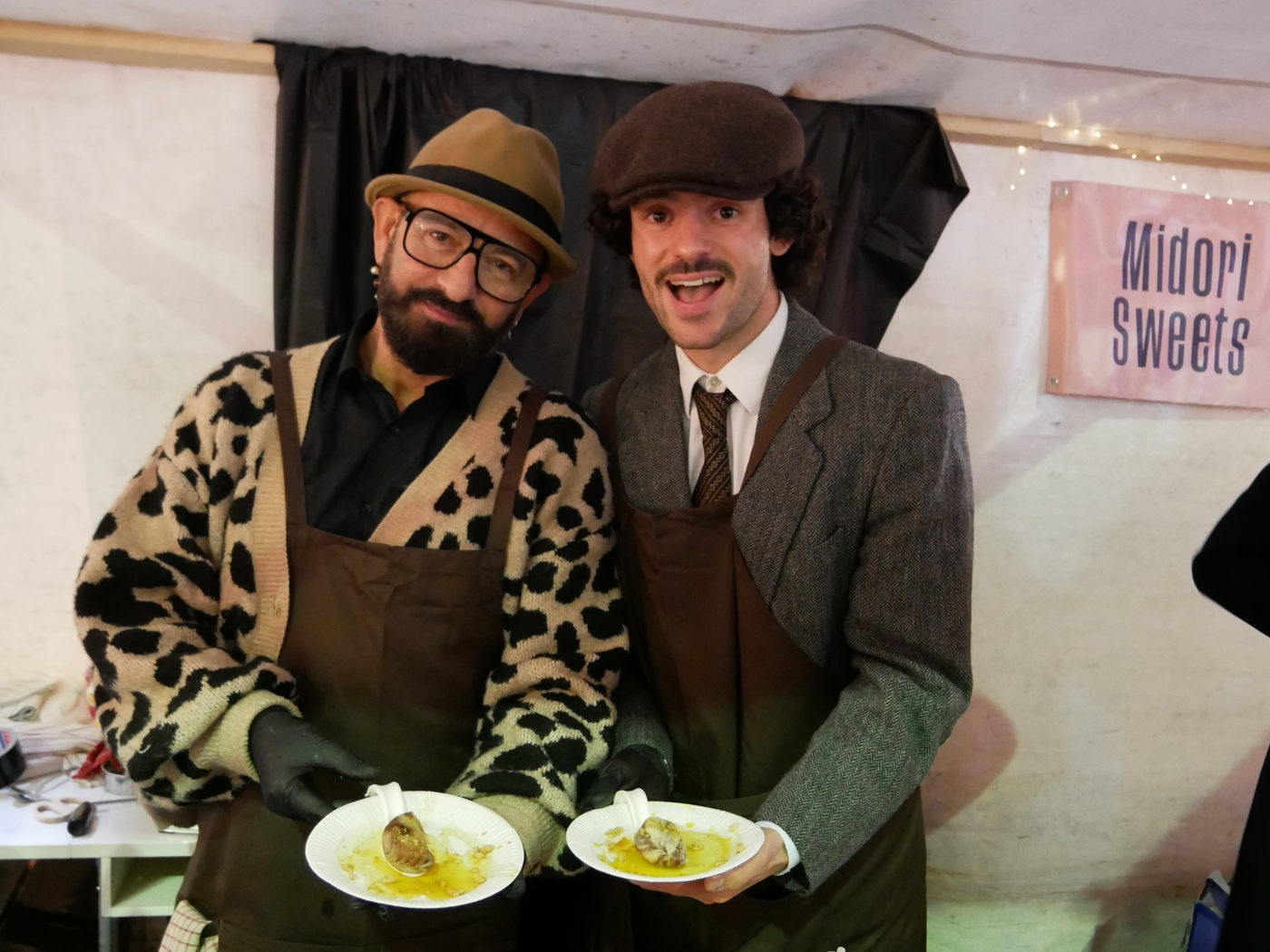 Hosts welcoming guests at an event organised by Berlin Italian Communication